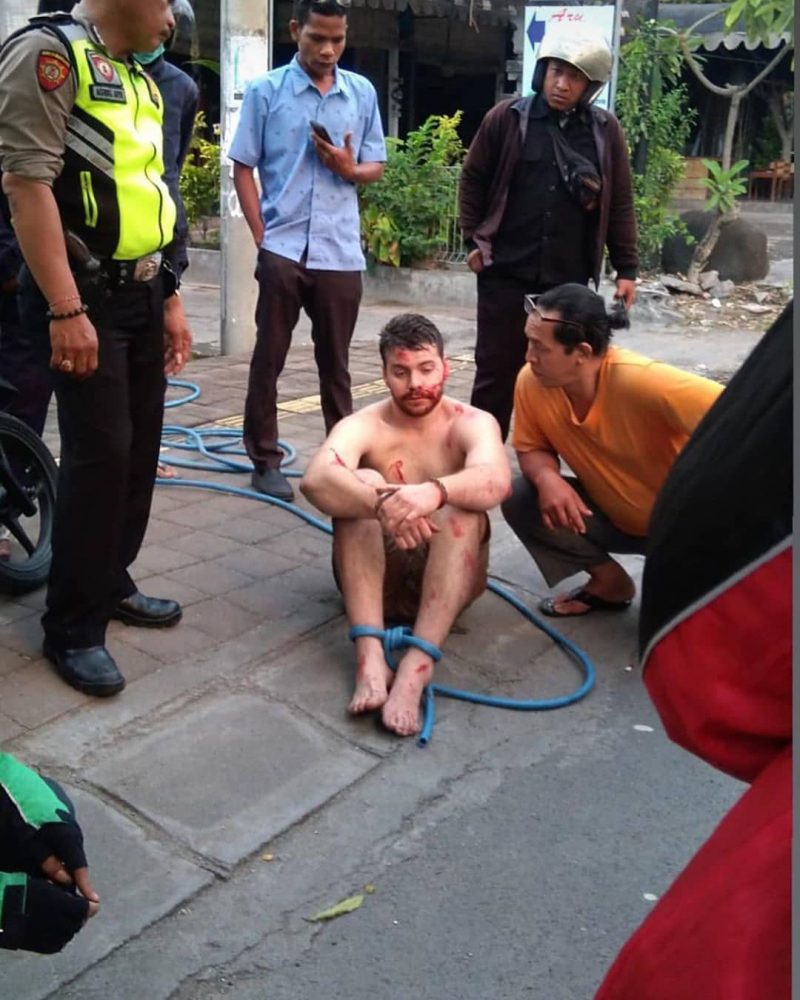 An Australian tourist was arrested in Bali, Indonesia after committing a slew of random, violent acts on the streets over the weekend.