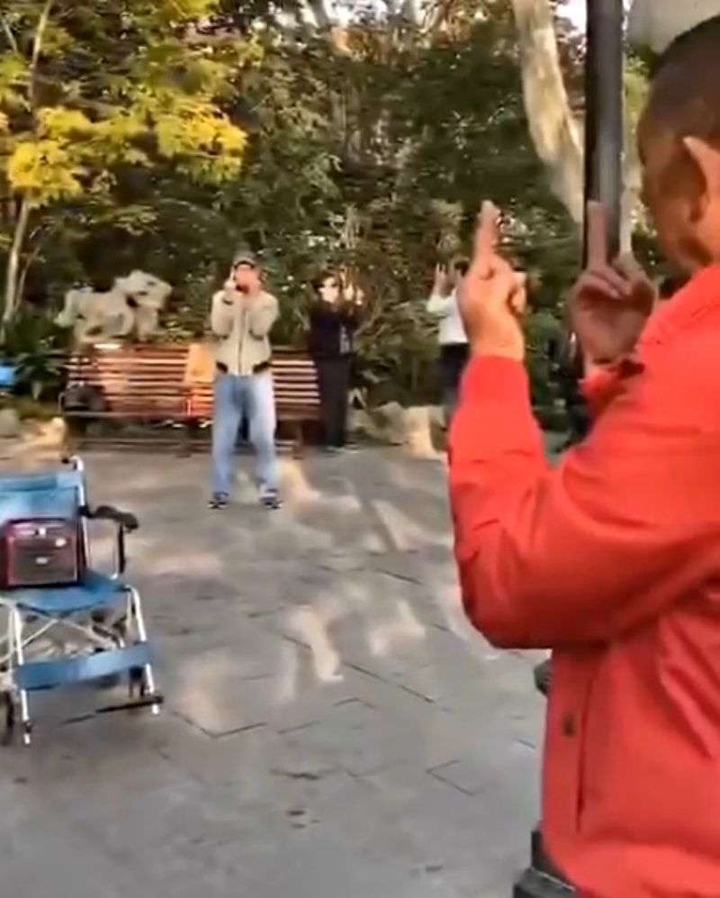A video of a group of elderly people raising their middle fingers during a meditation session at a park in Shanghai has gone viral on social media.
