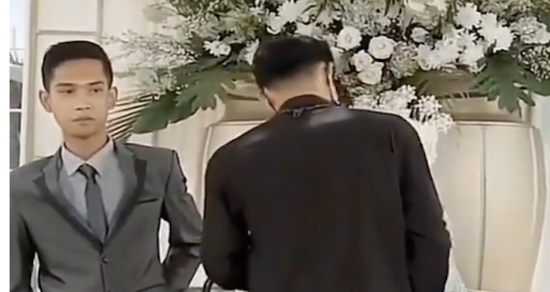 Man watches uncomfortably as wife’s ex hugs her at their wedding