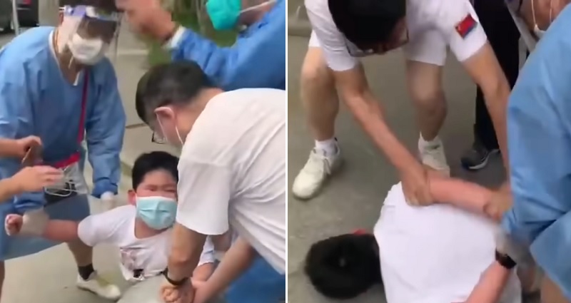 10-year-old boy filmed threatening to stab Shanghai health worker with knife during COVID test