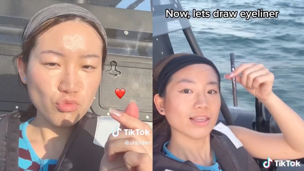 Woman does makeup on speedboat