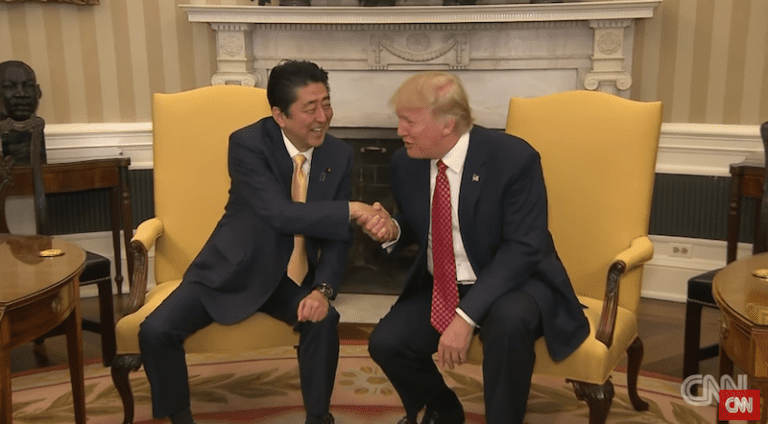 Trump Gives the Most Cringeworthy Handshake of All Time to Japan’s Prime Minister