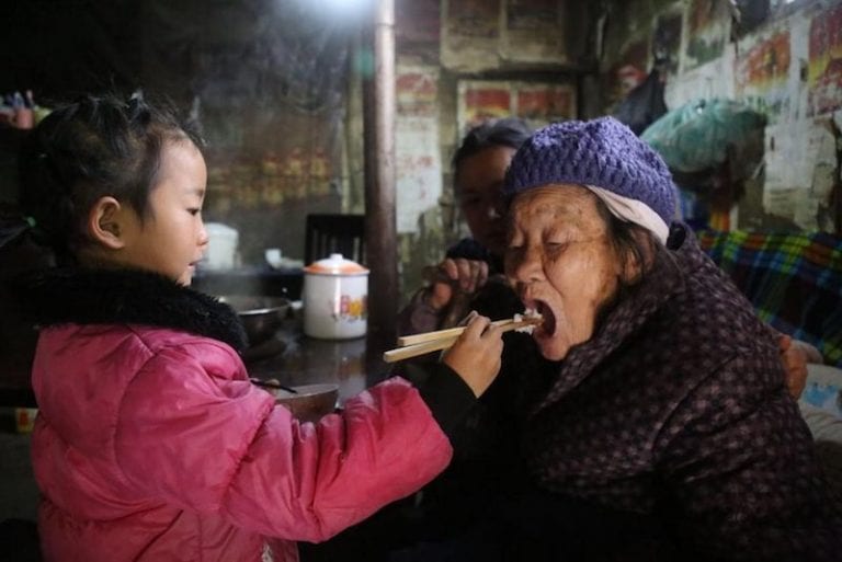 Little Girl Takes Care of Both Her Grandmothers After Her Parents Abandoned Her