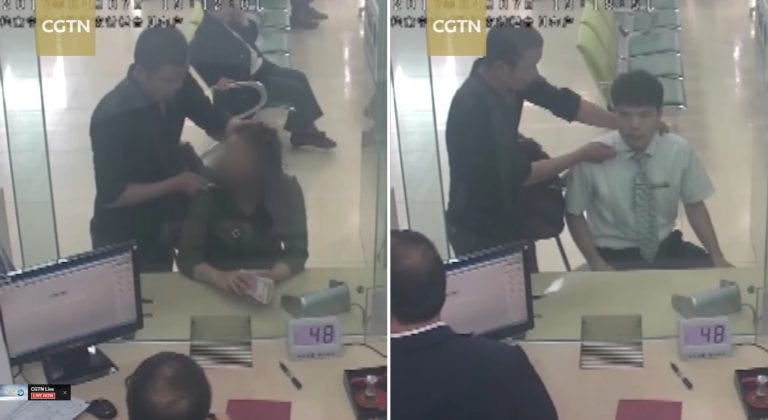 Brave Chinese Bank Employee Takes Place of Female Hostage to Save Her Life