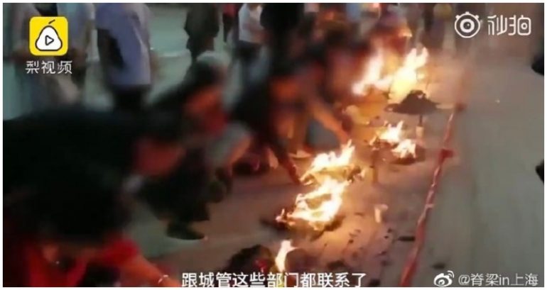 Parents Burn Offerings Outside School to Wish Kids Good Luck on the Gaokao