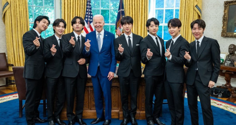 Netizens react to President Biden posing with a finger heart for Oval Office photo with BTS