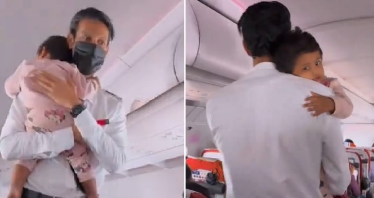 An Air India flight attendant is winning hearts for how he handled a crying baby mid-flight