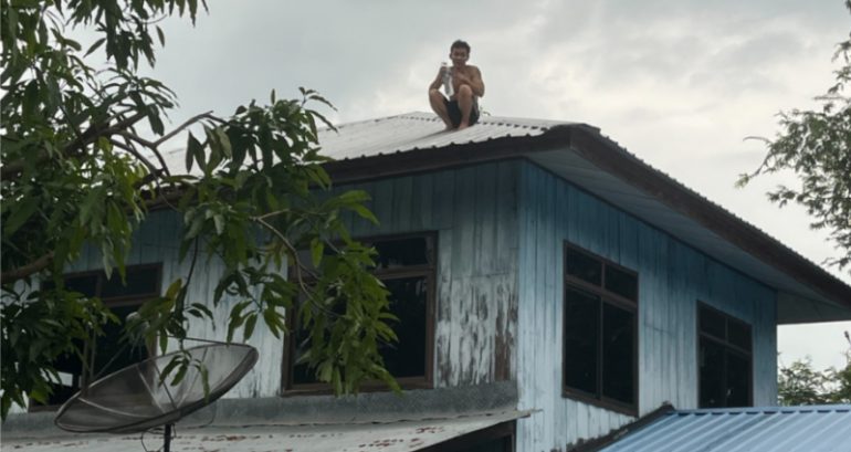 Thai man spends two days on roof after his family wouldn’t let him smoke weed