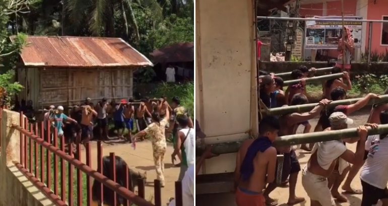 Viral ‘bayanihan’ video shows Filipinos carrying old man’s house in heartwarming gesture