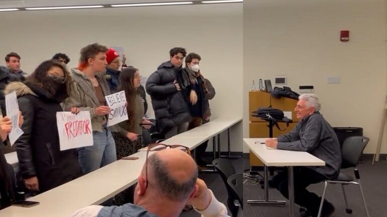 Harvard students stage walkout in front of professor accused of sexual harassment