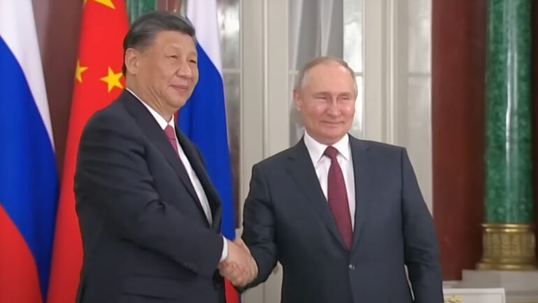 Xi Jinping tells Putin they are ‘driving changes not seen for 100 years’ during Kremlin farewell