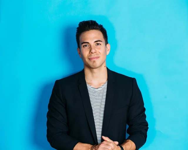 Apolo Ohno against a blue background