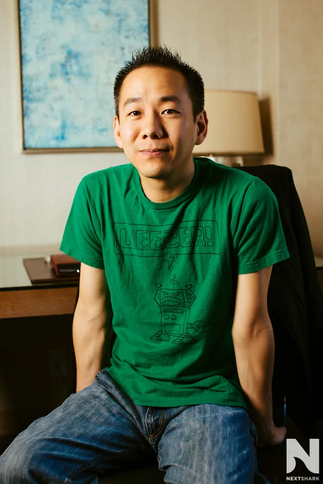 Rotten Tomatoes co-founder Patrick Lee seated in a green shirt